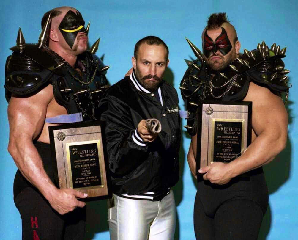 Legendary_ Wrestling_ Trio_with_ Awards Background