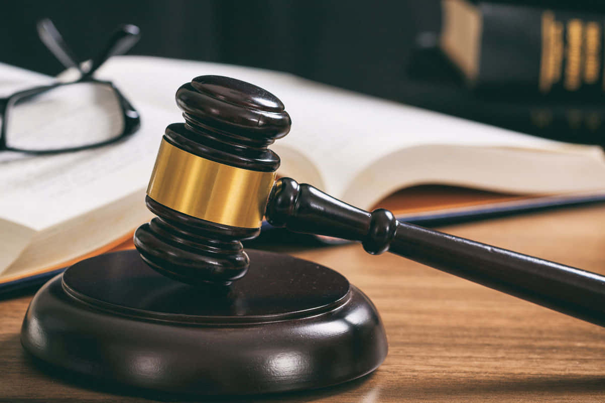 Legislative Black And Gold Gavel Background