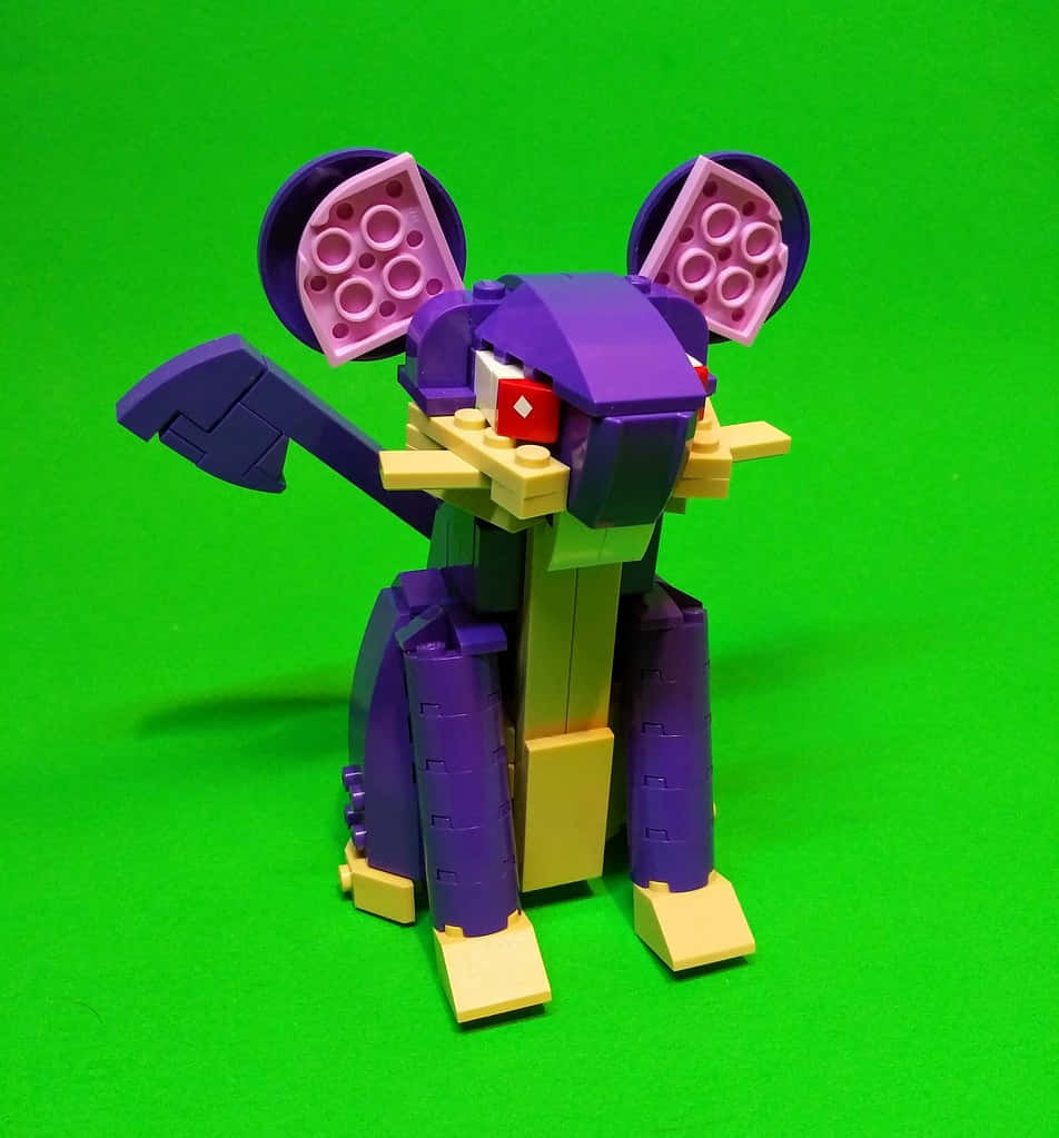 Lego Pokemon Rattata Standing On A Green Backdrop