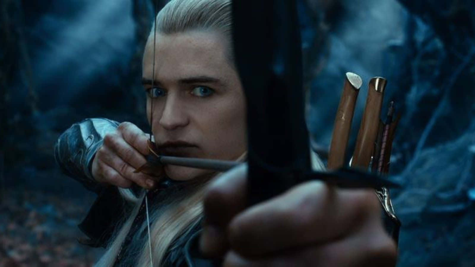 Legolas The Elf Glancing Off Into The Horizon Background