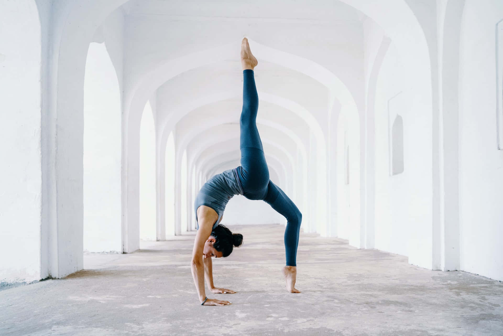 Legs Spread In Arched Hallway