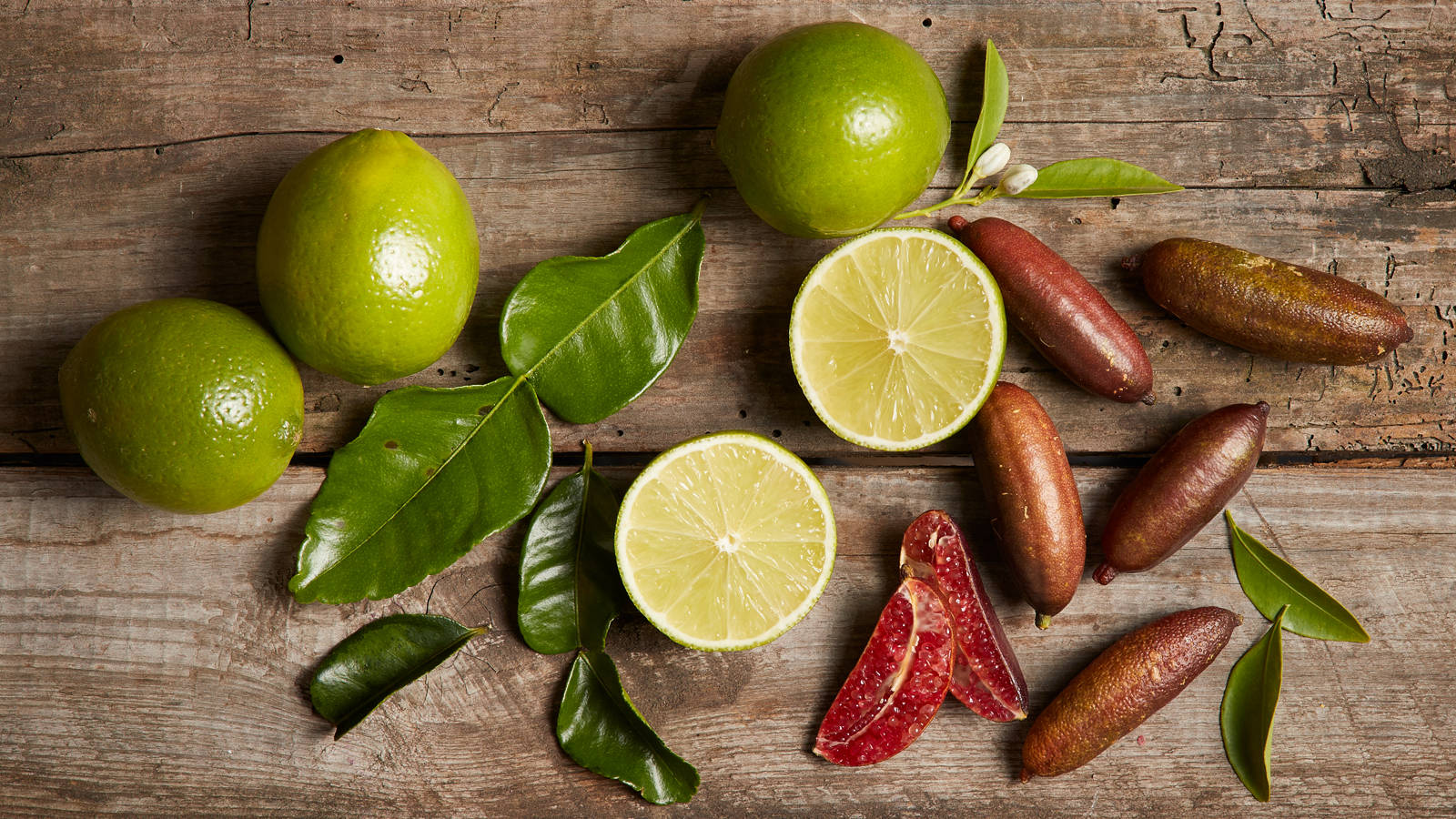 Lemons, Limes, And Finger Limes Background