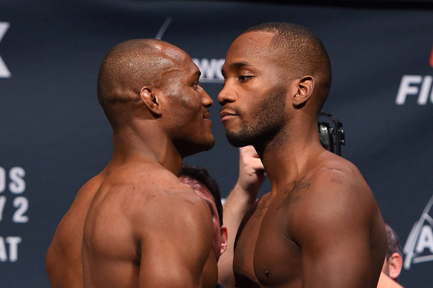 Leon Edwards And Kamaru Usman Close Background