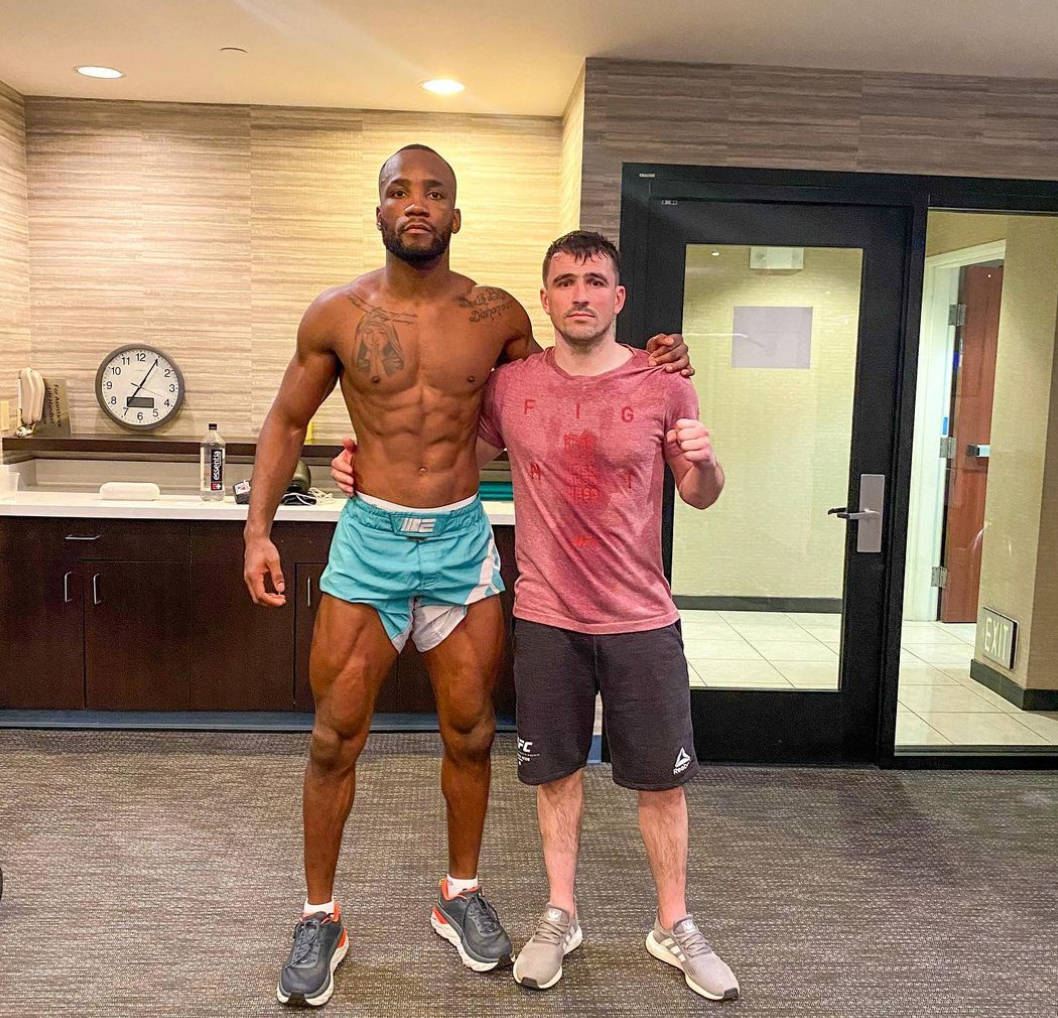 Leon Edwards Posing With Fan Background