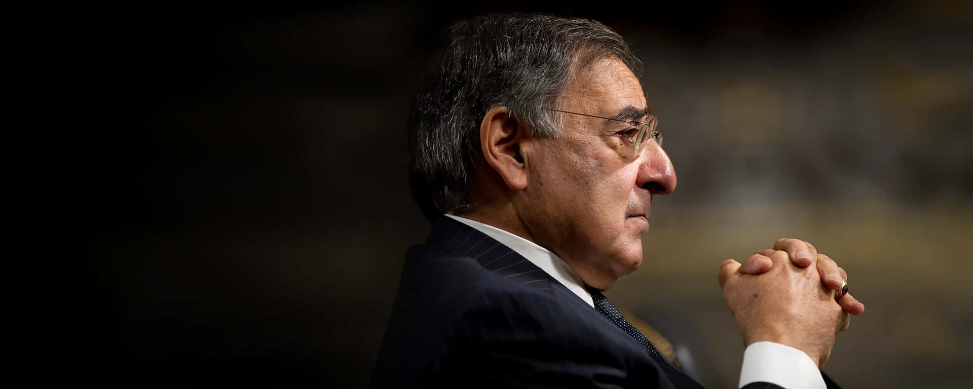 Leon Panetta Fingers Entwined Background
