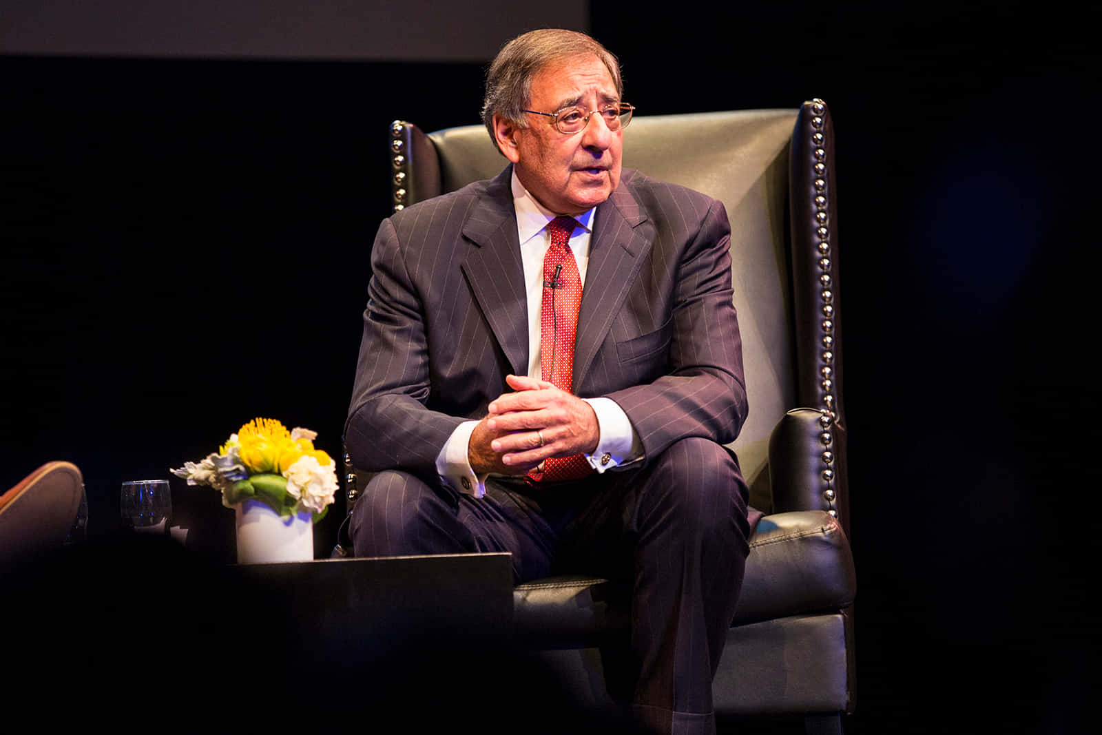 Leon Panetta Sitting On Chair Background