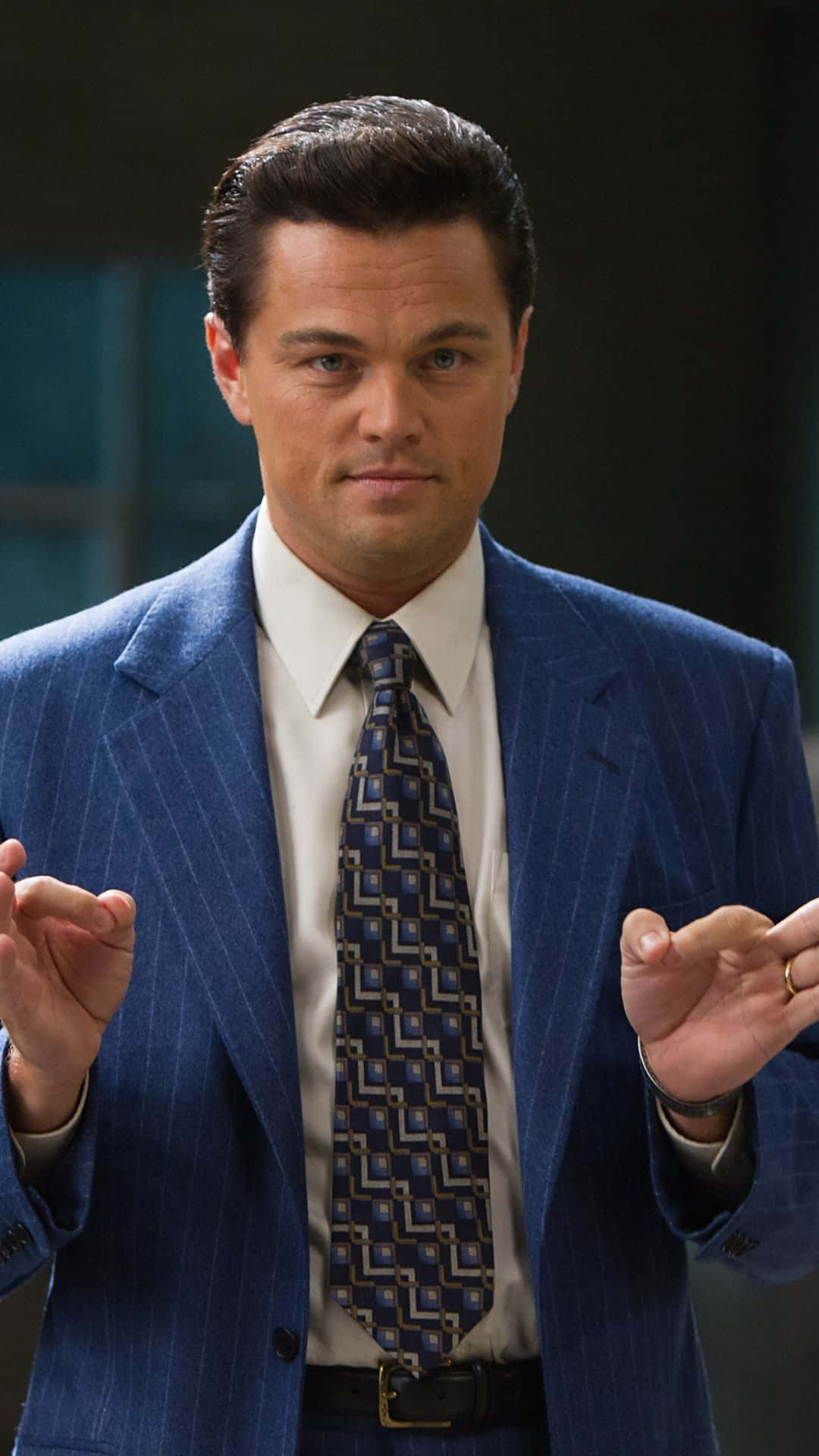 Leonardo Dicaprio Embracing His Iconic Role As Jordan Belfort In The Wolf Of Wall Street Background