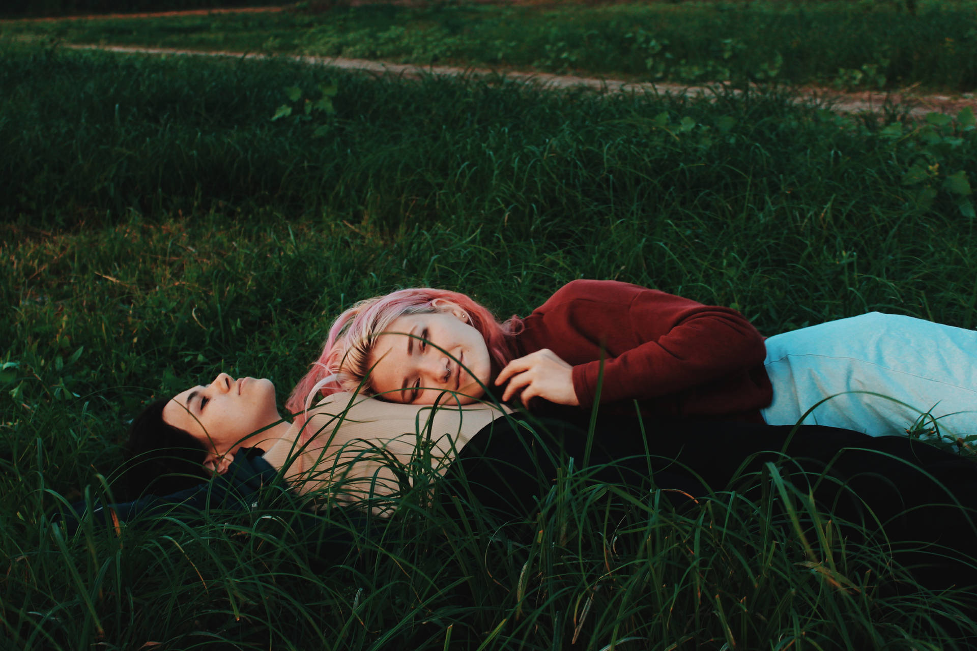 Lesbian Couple On Grass Field Background