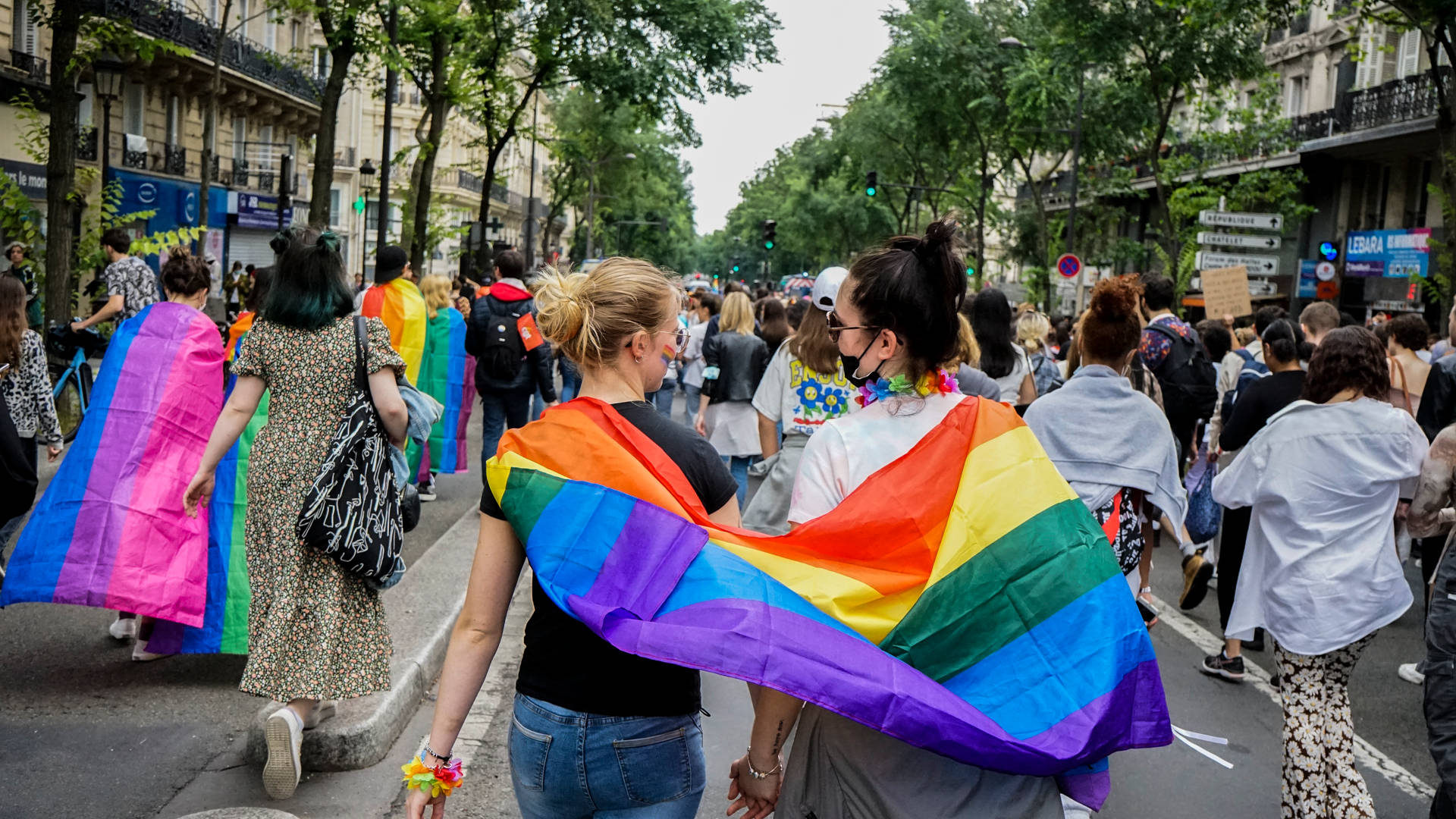 Lesbian With Rainbow Flag Background