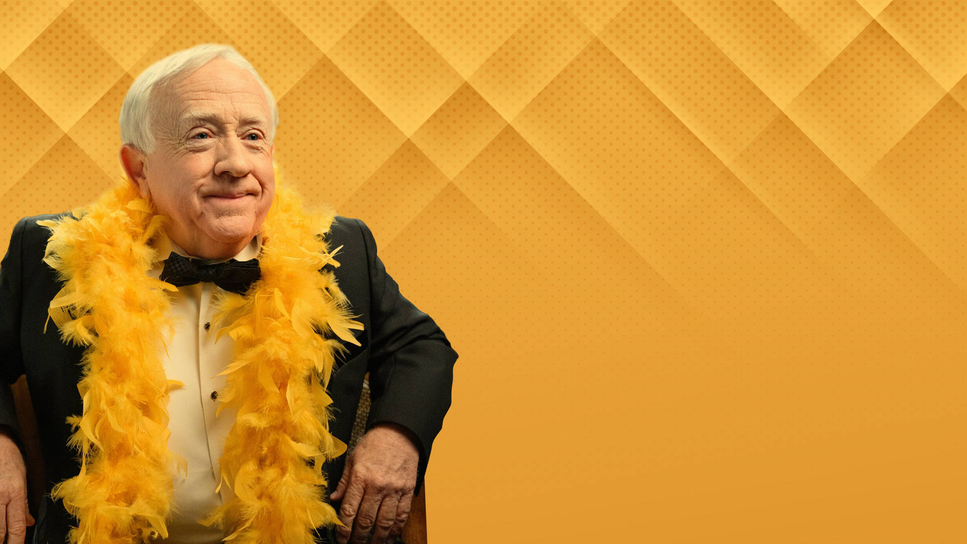 Leslie Jordan Feathery Orange Background Background