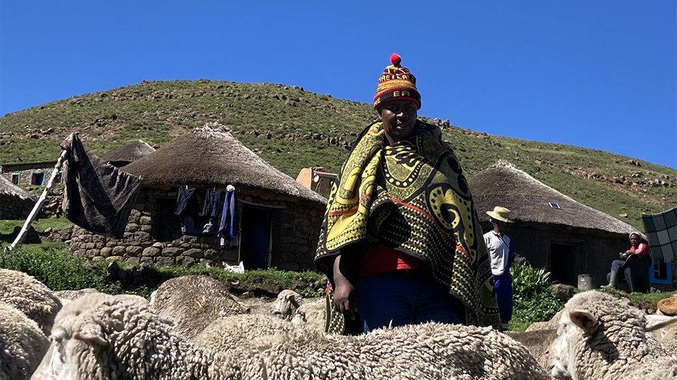 Lesotho Kneeling Person Background