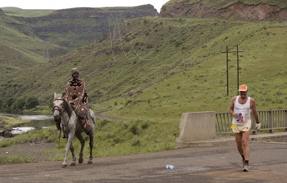 Lesotho Man Horseback Walking Background