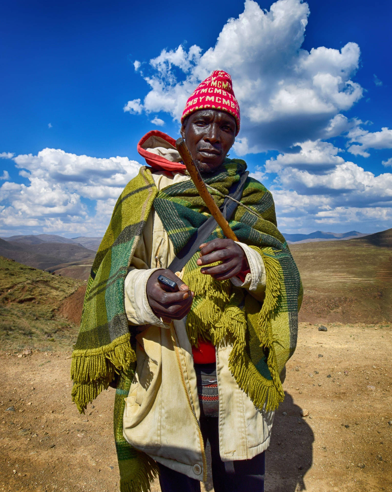 Lesotho Man Red Hat Background