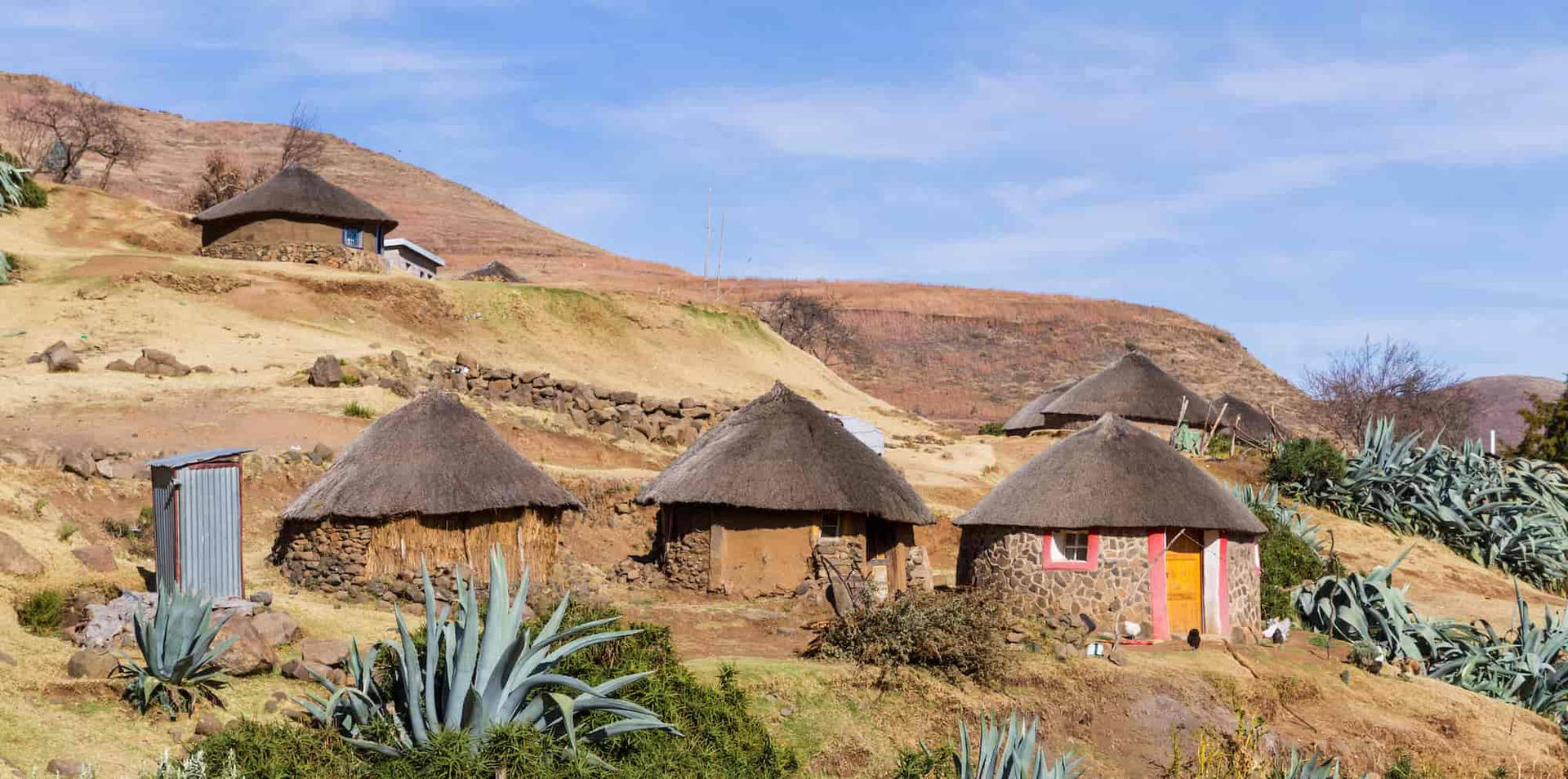 Lesotho Stone Mountain Huts Background