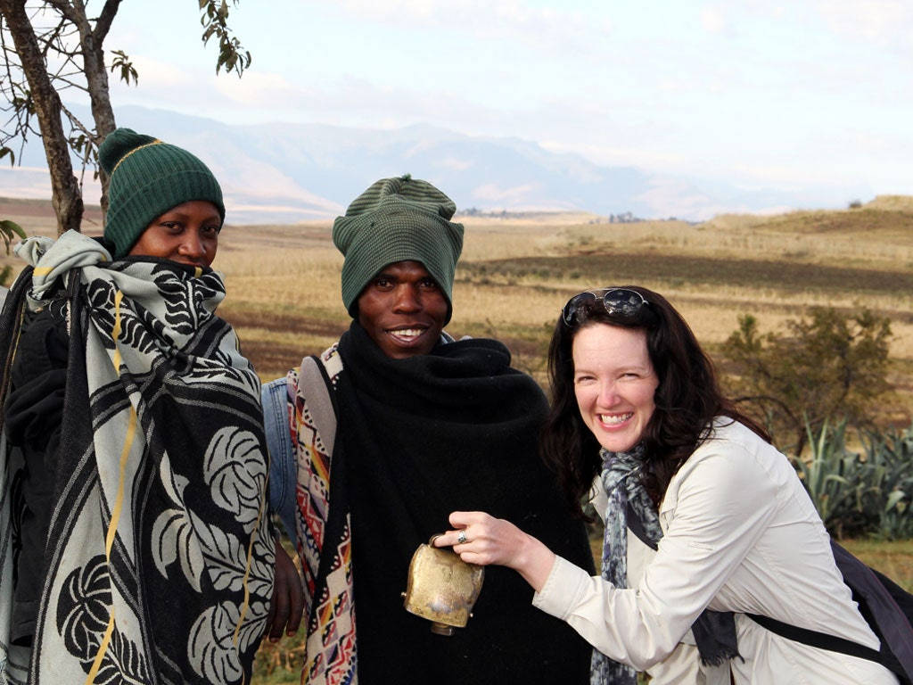 Lesotho Tourist Smiling Locals Background