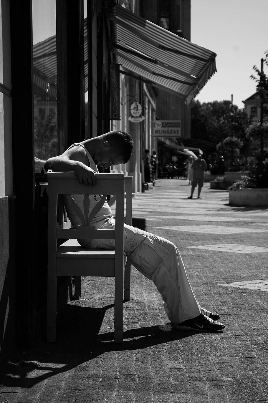 Lethargic Man On Bench Background