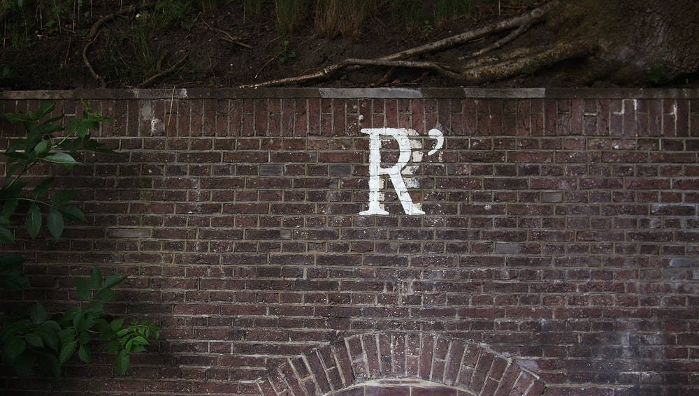 Letter R On The Wall Background