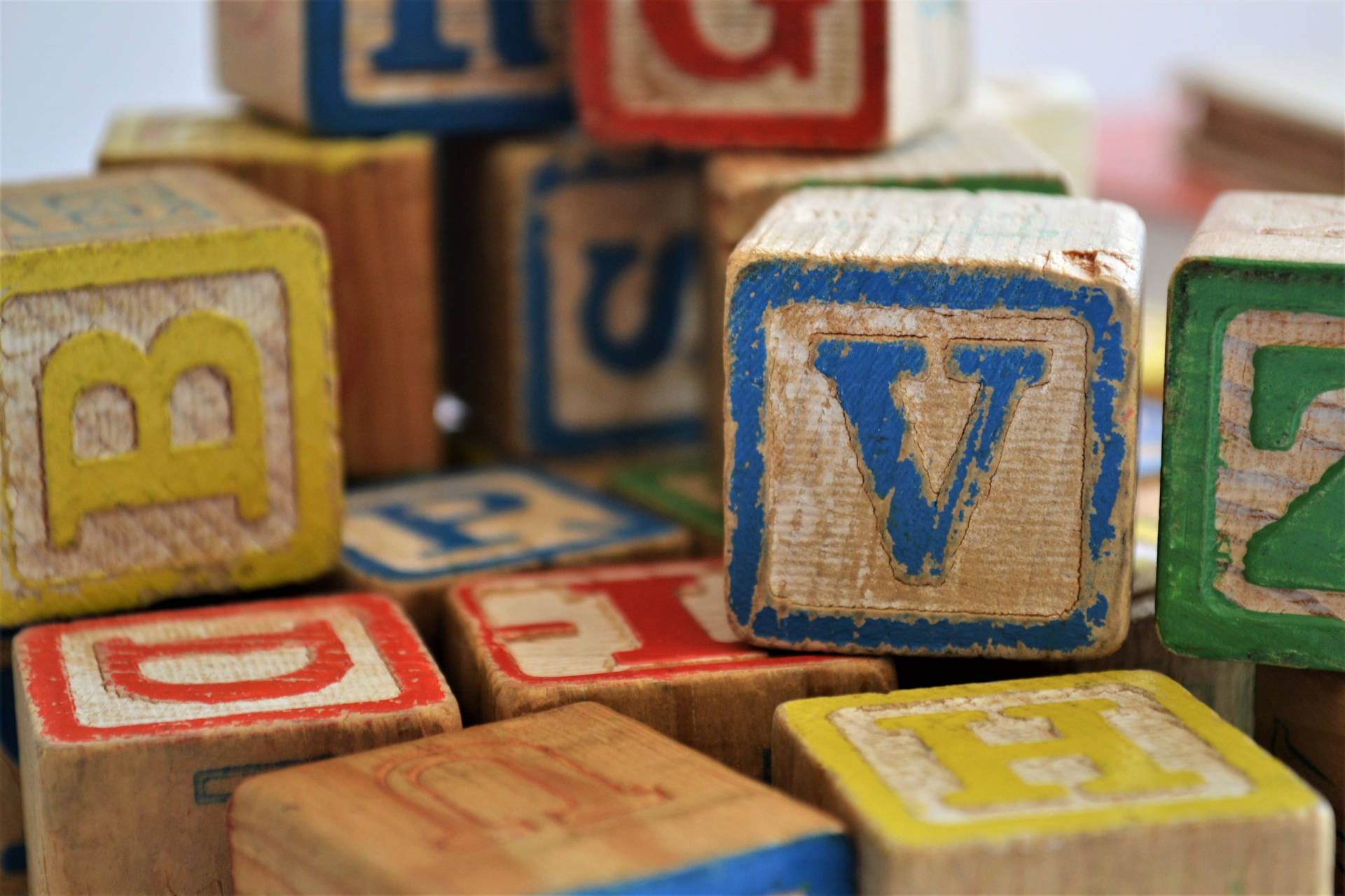 Letter V Toy Blocks Background