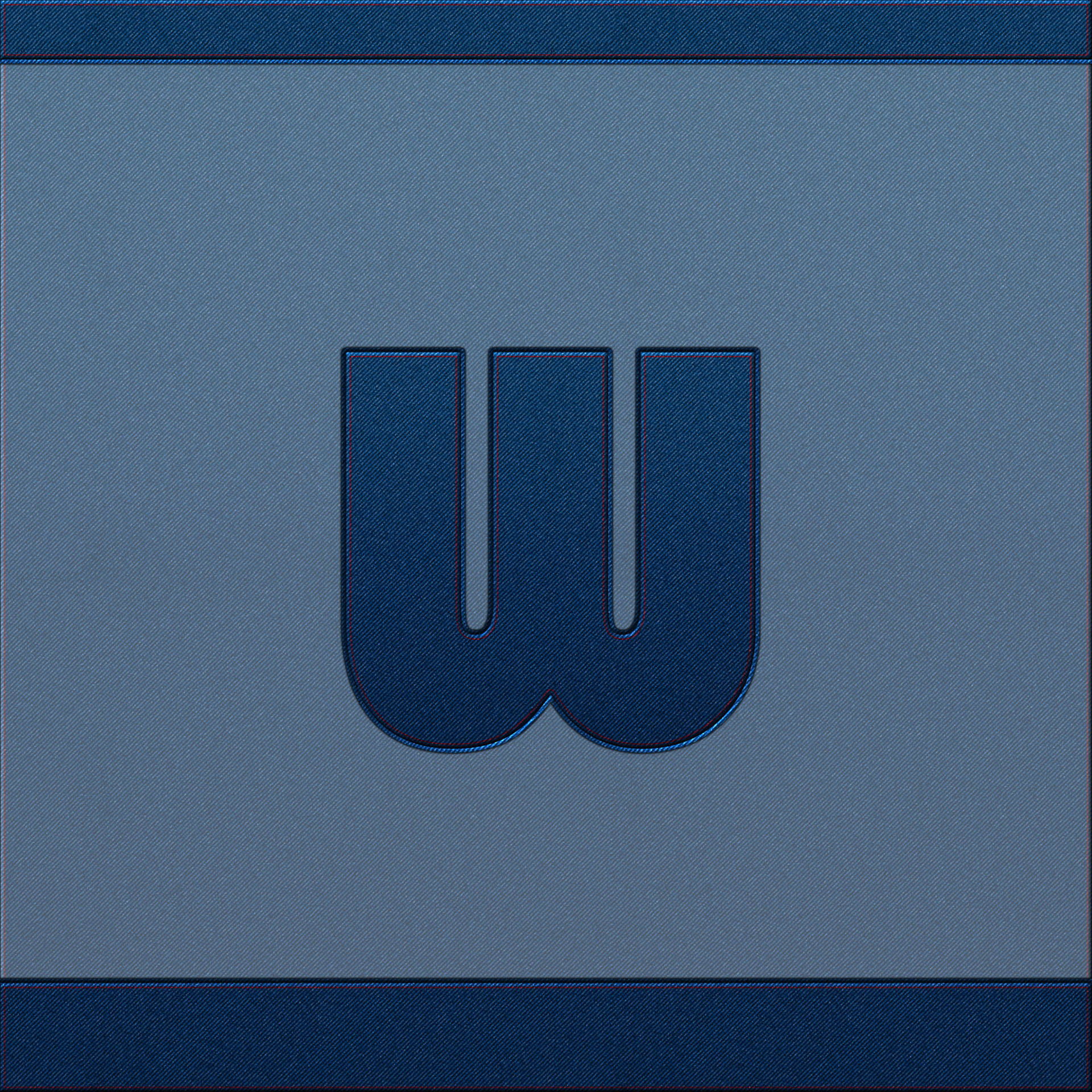 Letter W In Denim Background