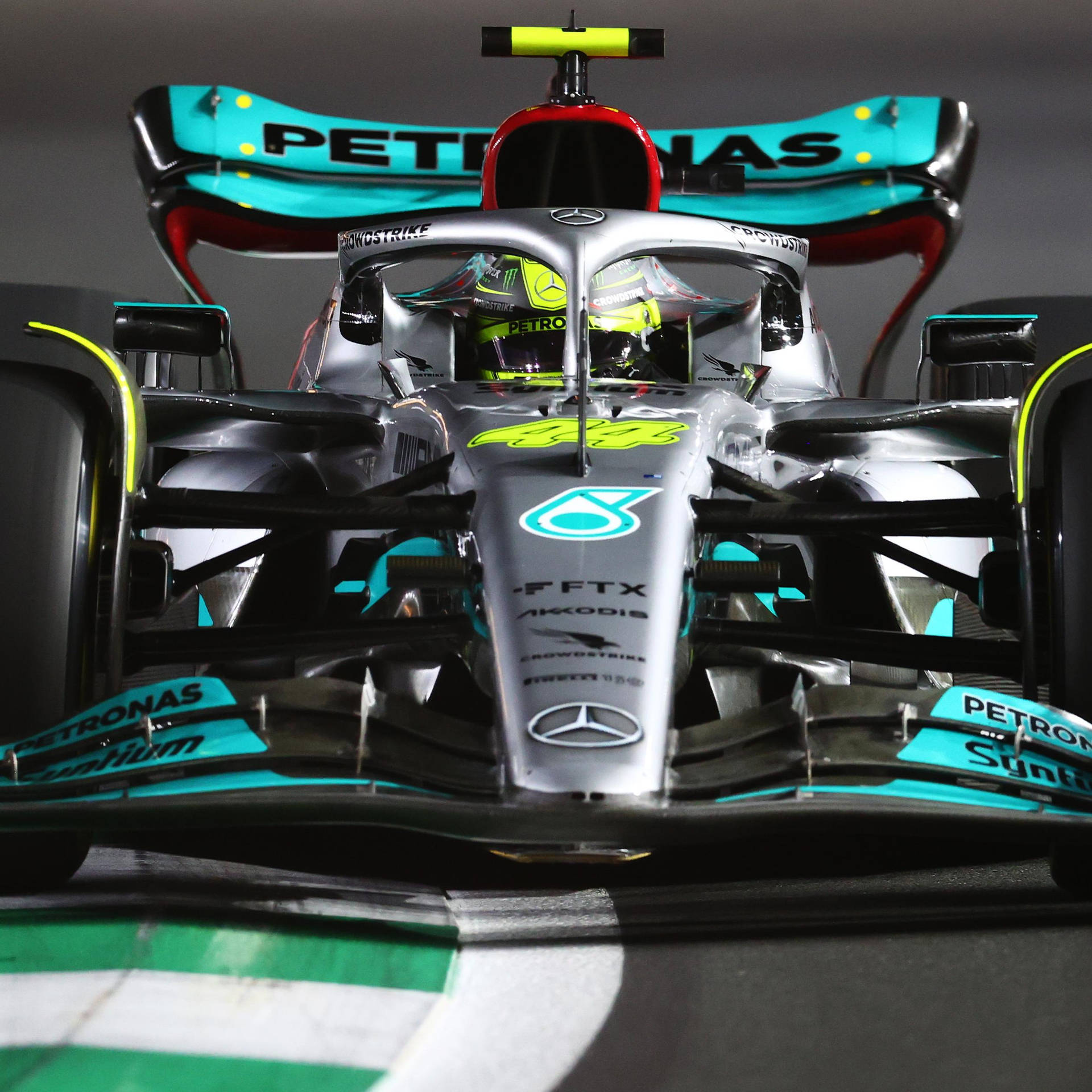 Lewis Hamilton Showcasing Mercedes F1 Car's Back Wing Background