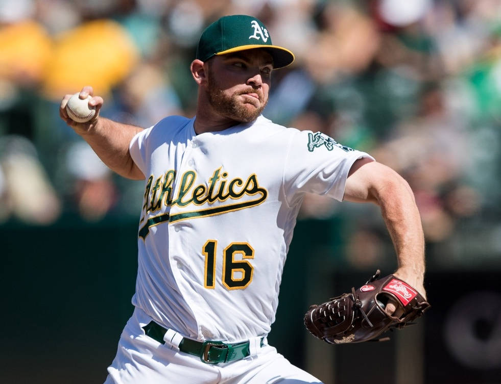 Liam Hendriks Pitching A Ball Background