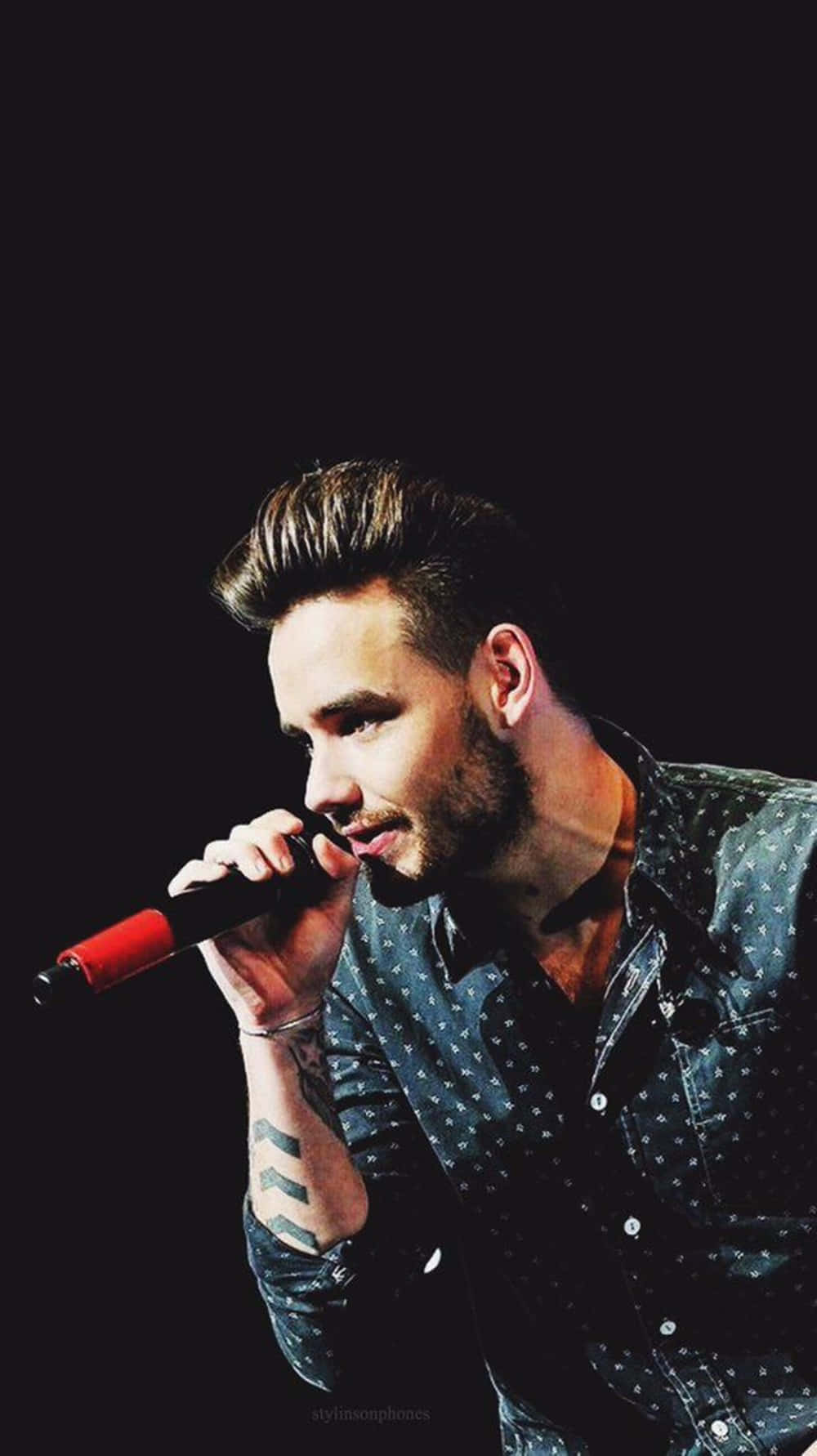 Liam Payne Rocks The Stage With His Electrifying Performance. Background