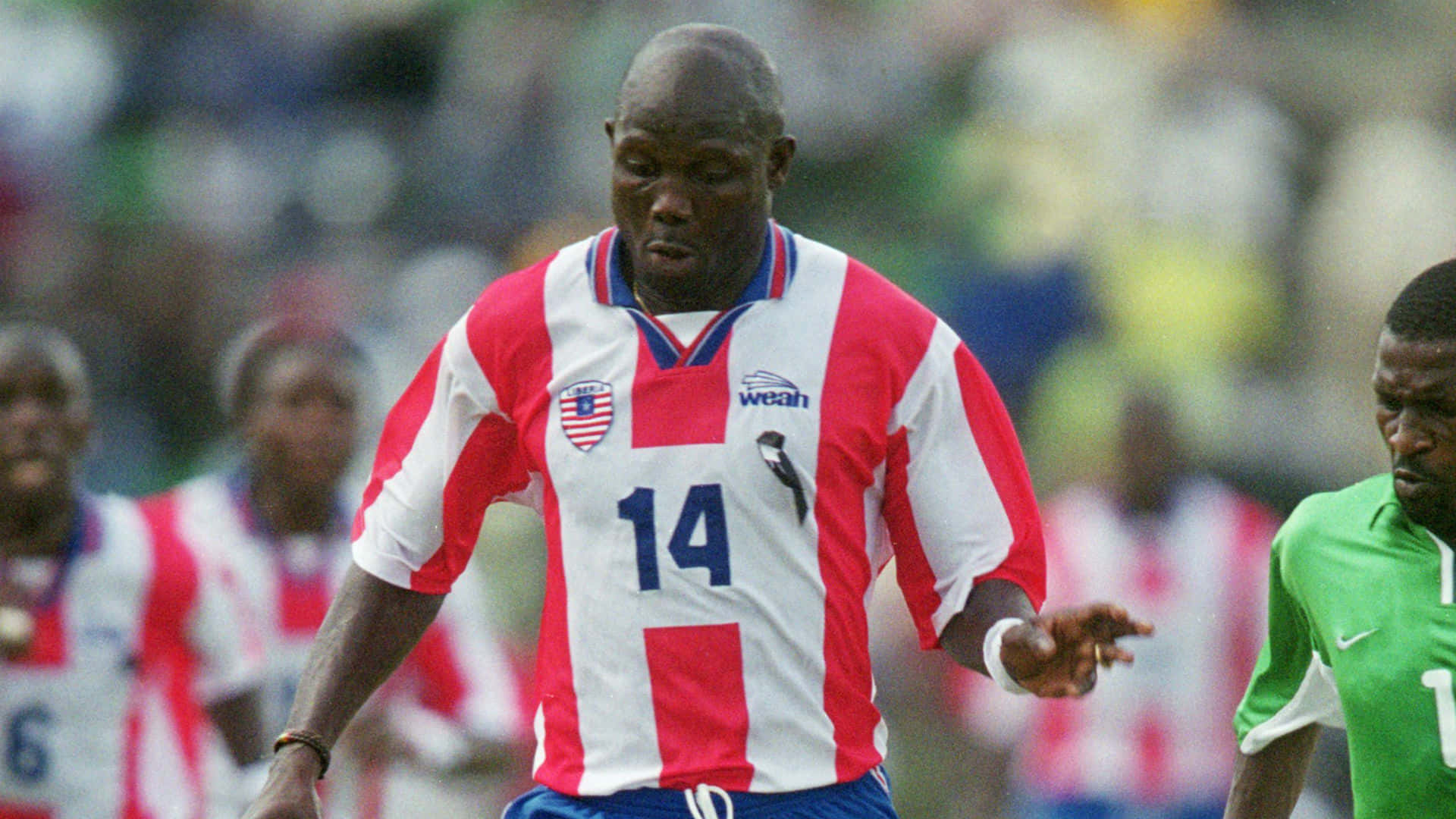 Liberian Football Player No. 14 George Weah Background