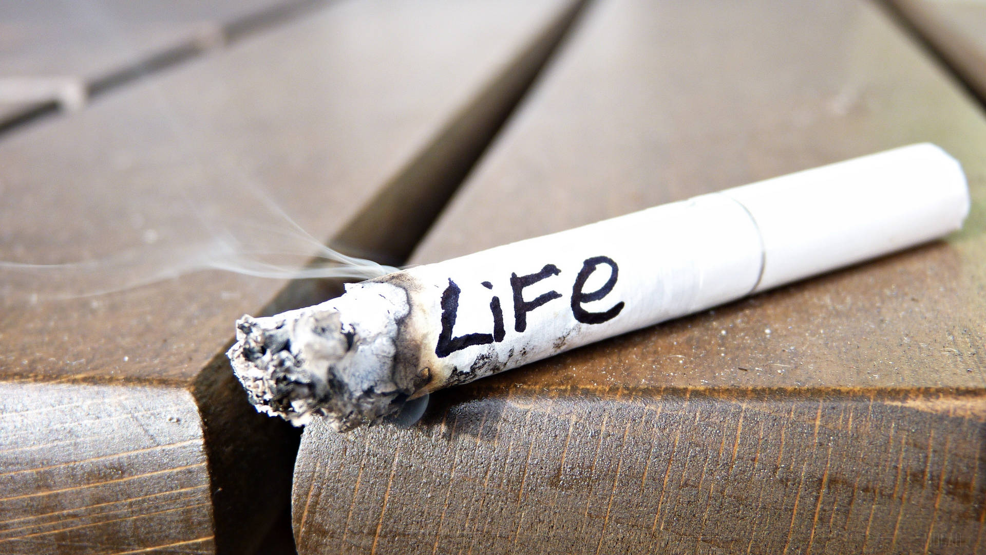 Life And Death In Cigarette Background