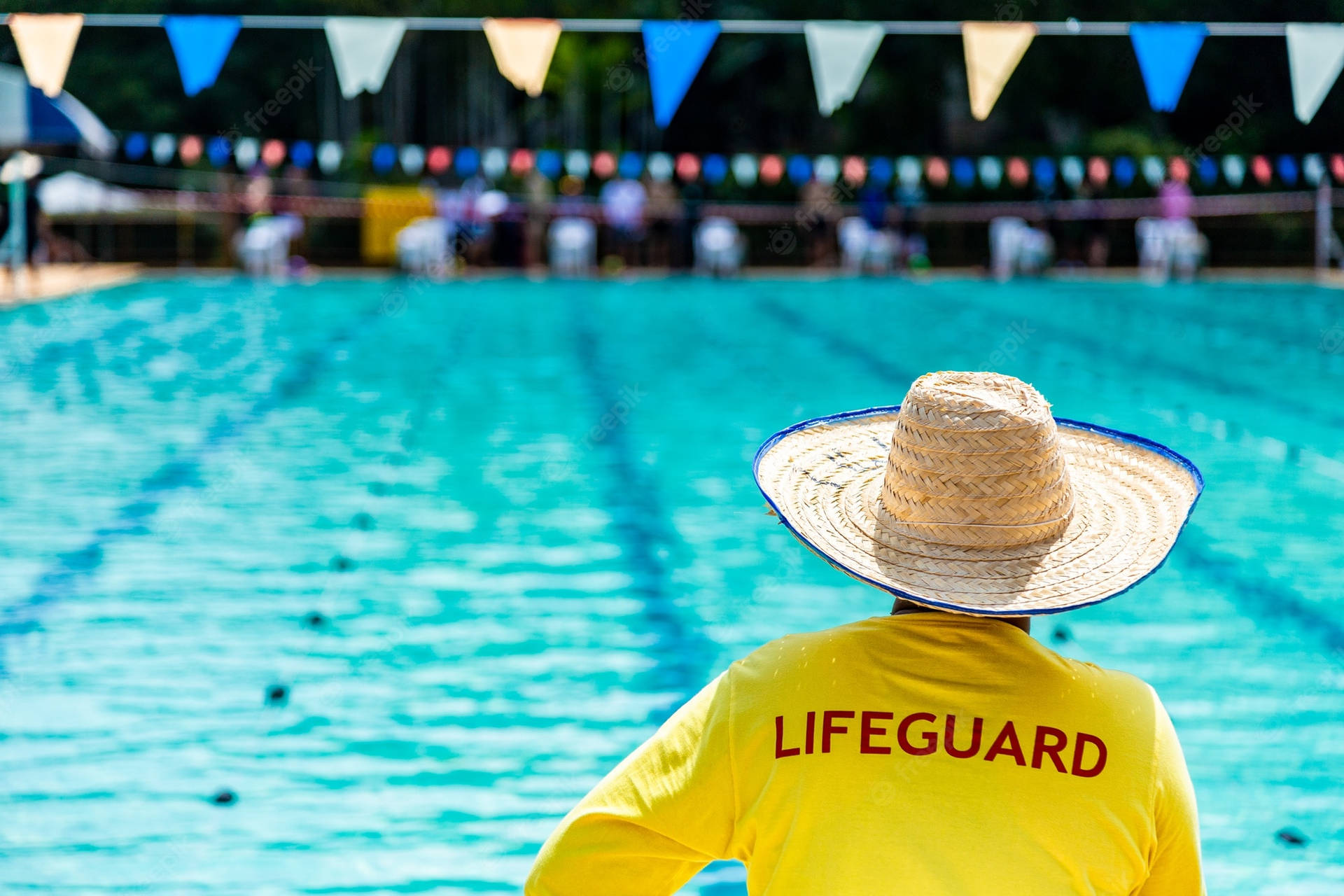 Lifeguard On Duty With Straw Hat