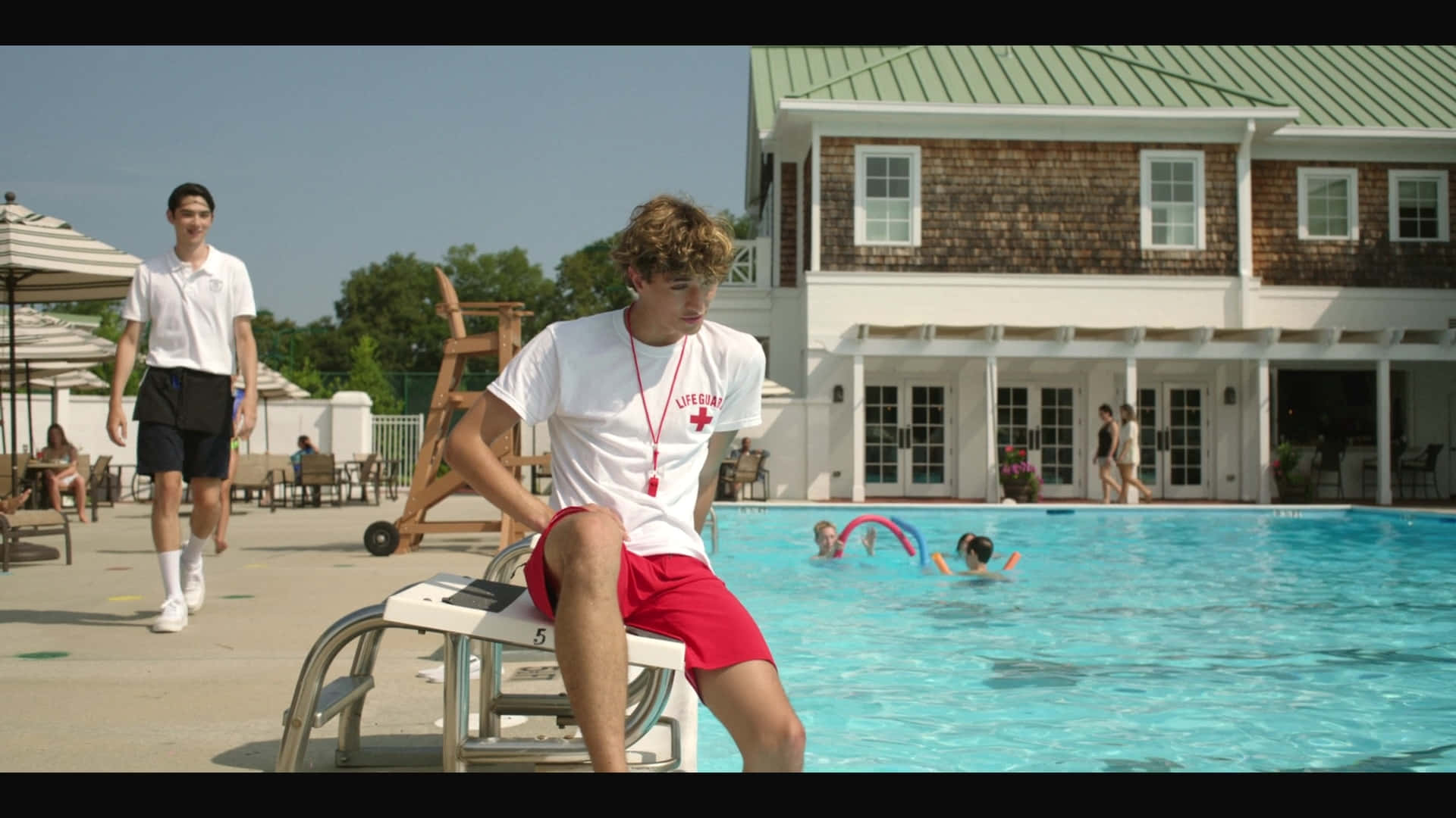 Lifeguard Watching Over Pool Background