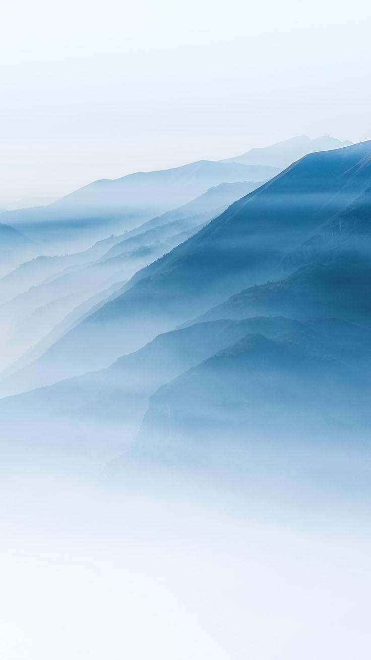 Light Blue Phone Mountains Background