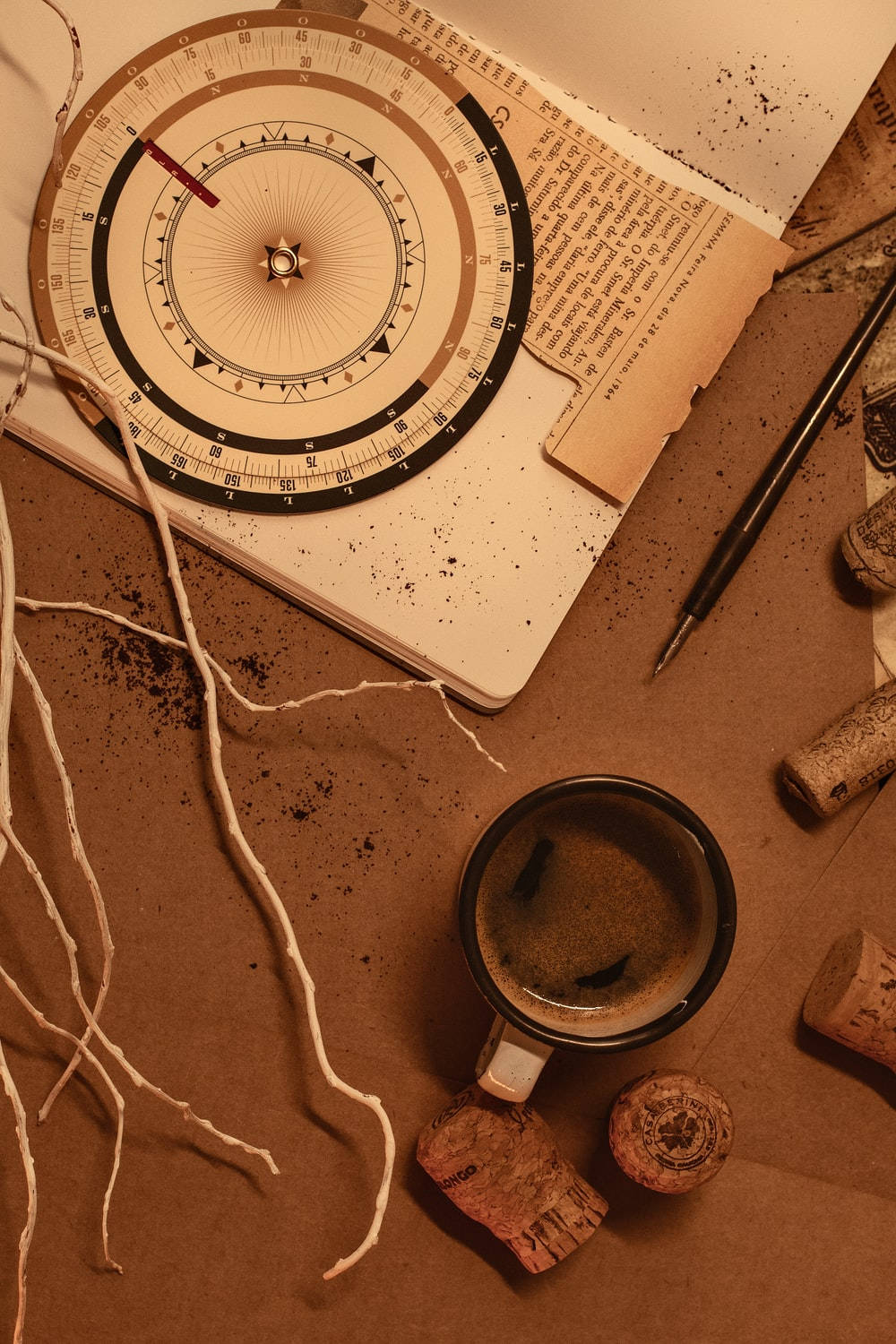 Light Brown Aesthetic Compass And Coffee Background
