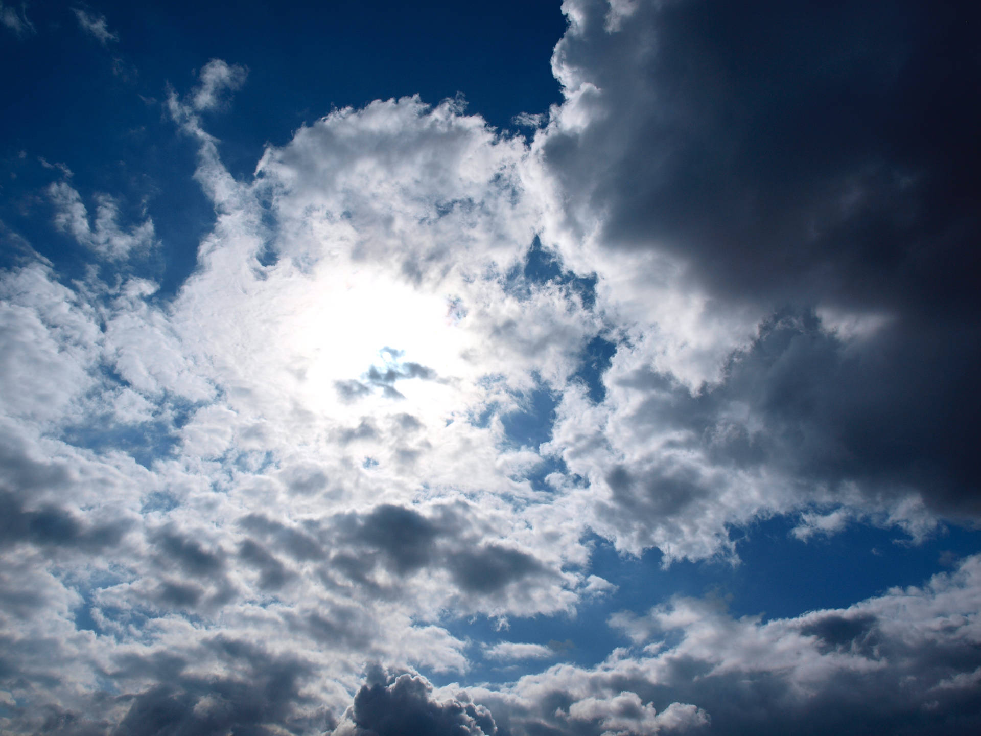 Light Glowing On Blue Aesthetic Cloud Background