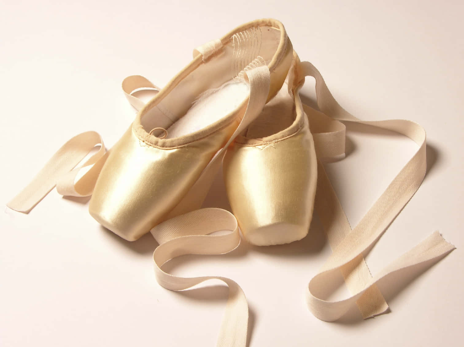 Light Gold Pointe Shoes Background