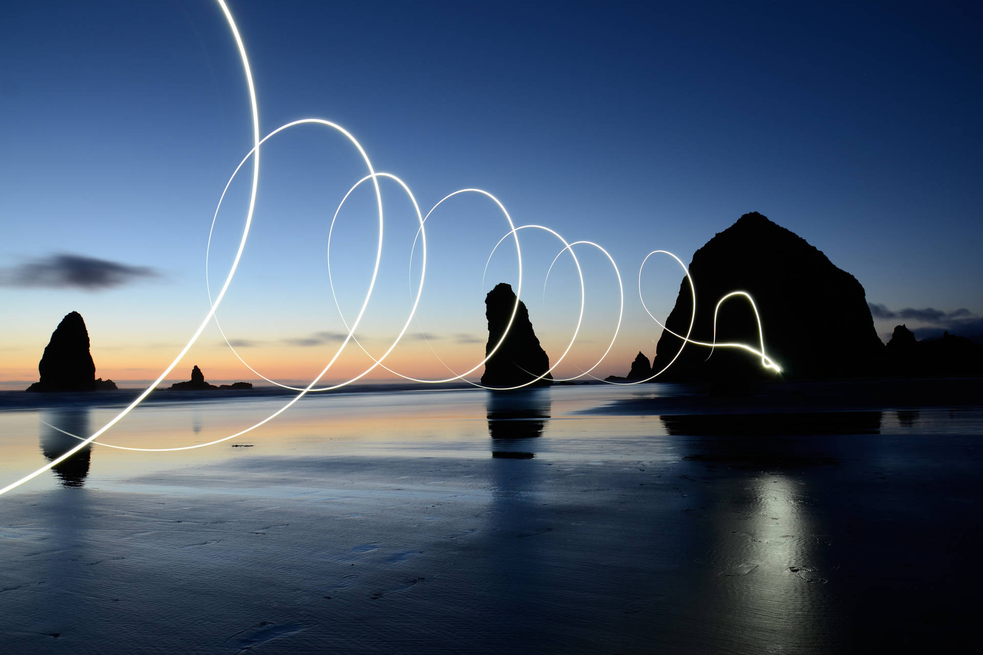 Light Painting On The Beach At Dusk Background