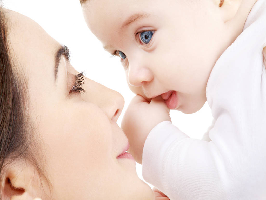 Light-skinned Mother And Blue Eyed Baby Background