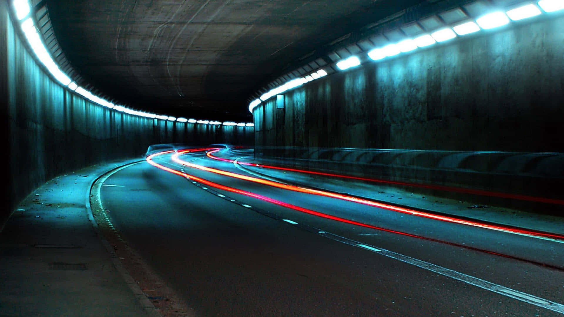 Light Trailsin Dark Tunnel Background