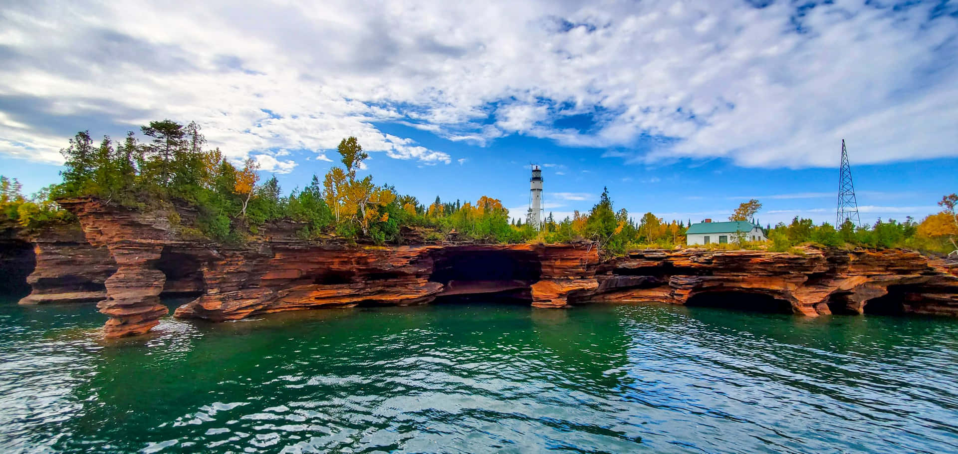 Lighthouse_ Above_ Cliffside_ Caves Background