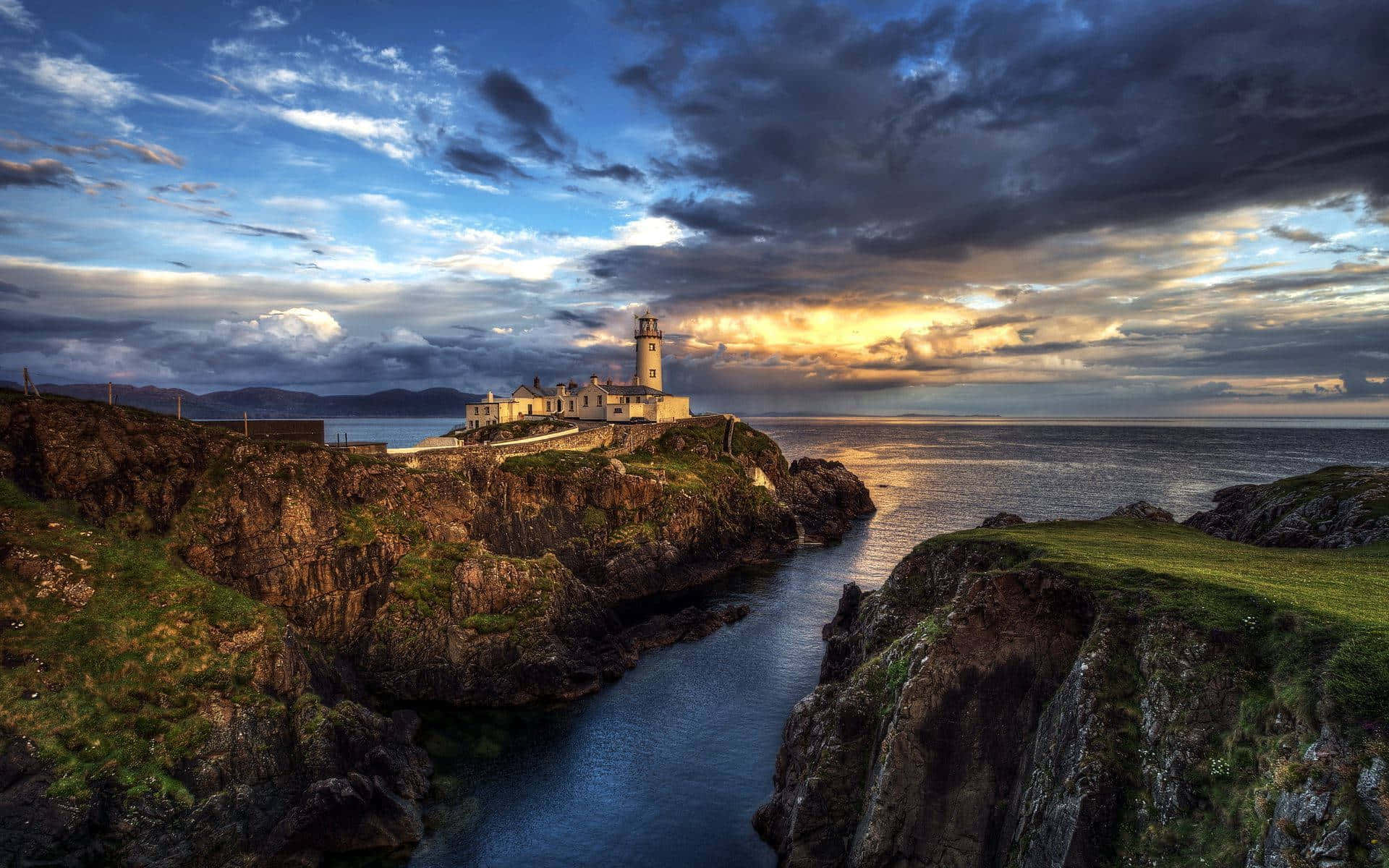 Lighthouse In Cliff Edge Ireland Desktop Background