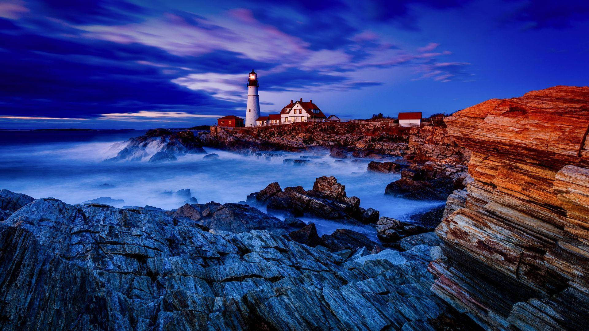 Lighthouse On Cliff Background