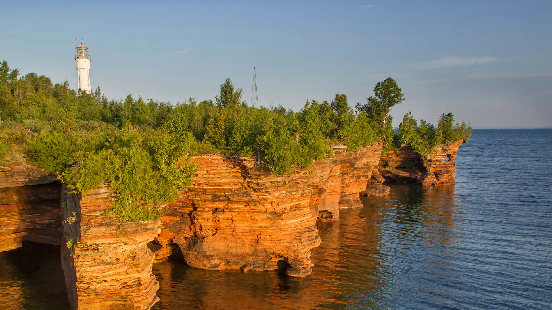 Lighthouse Overlooking Cliffside Waters