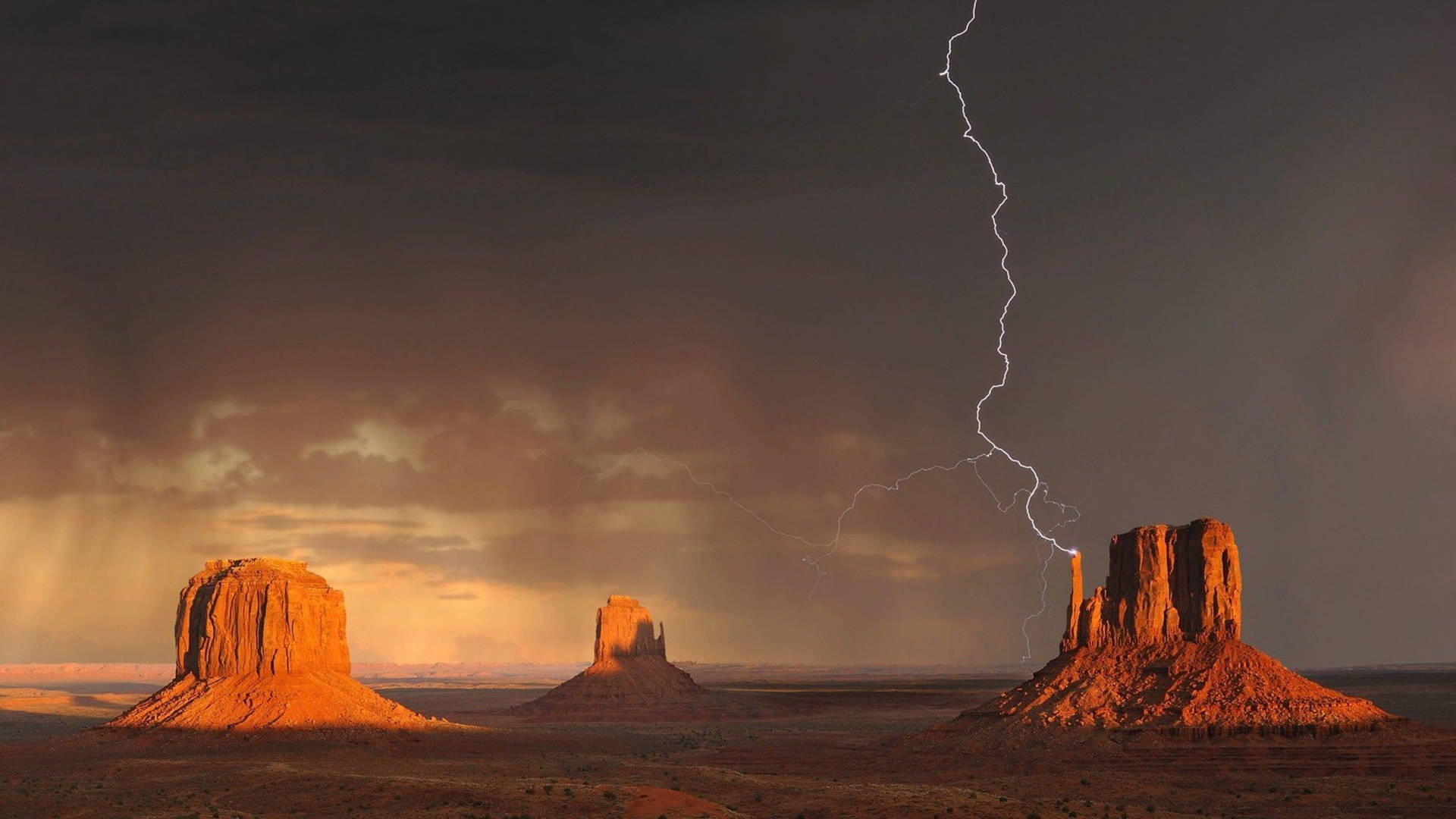 Lightning At Monument Valley Background