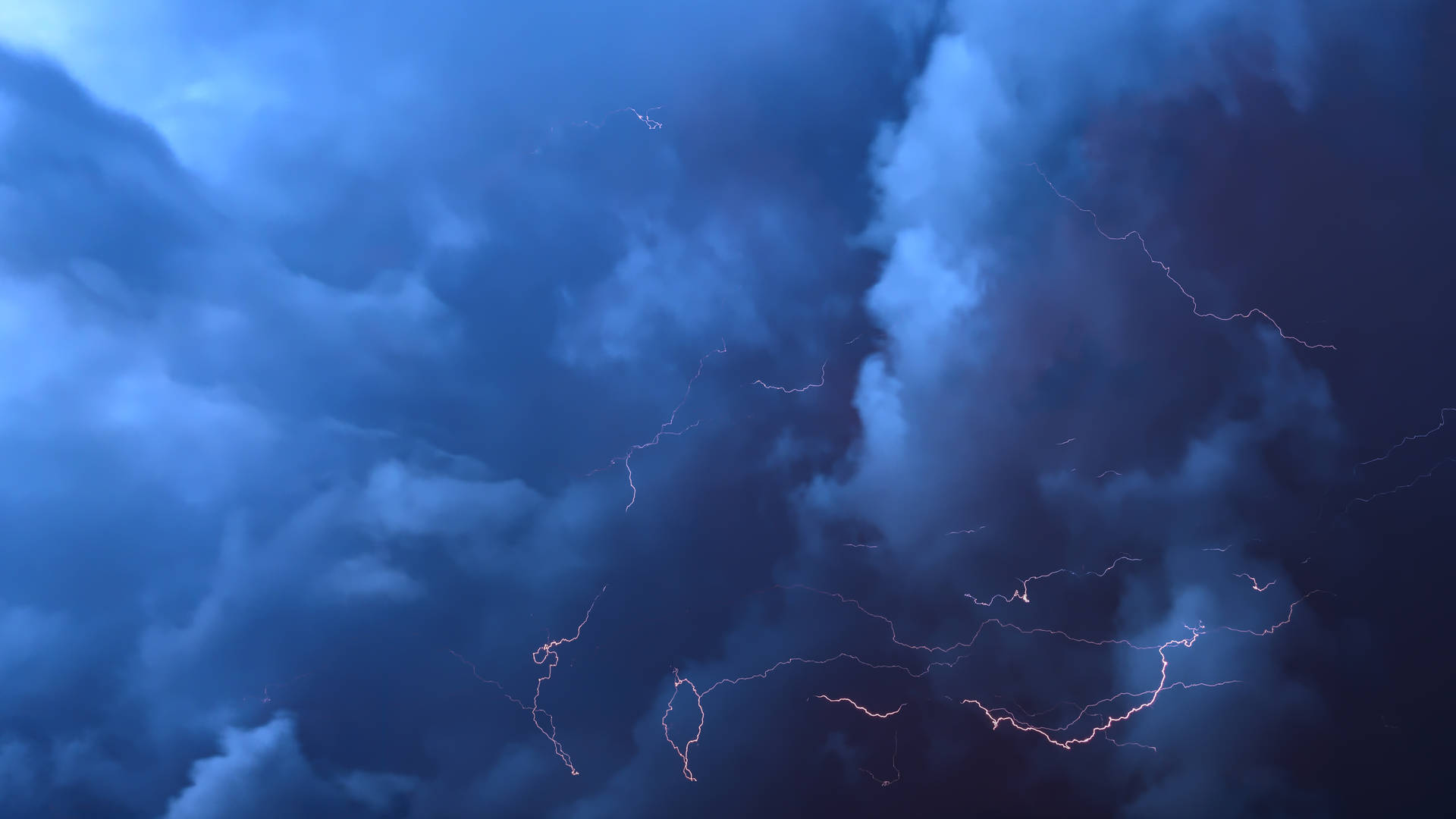 Lightning In Blue Cloud Background