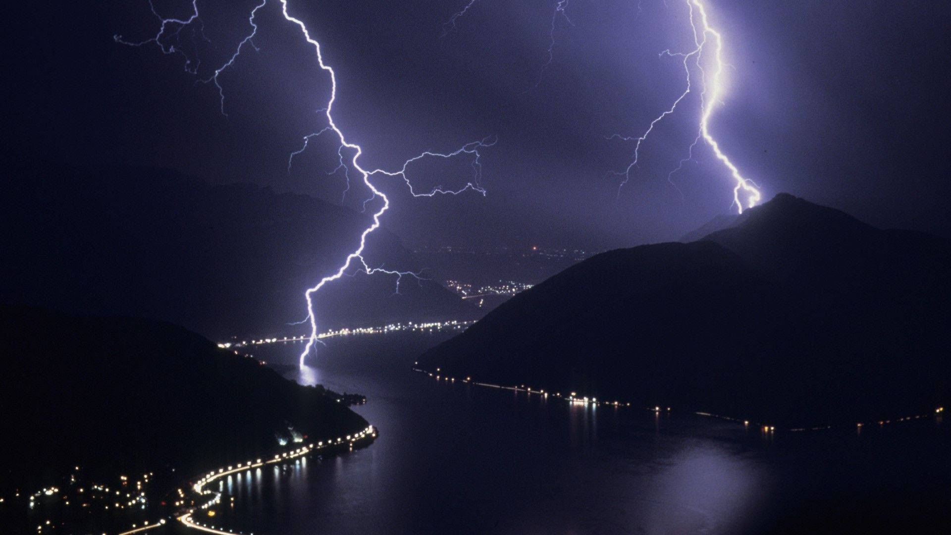 Lightning In Mountain And Sea Background