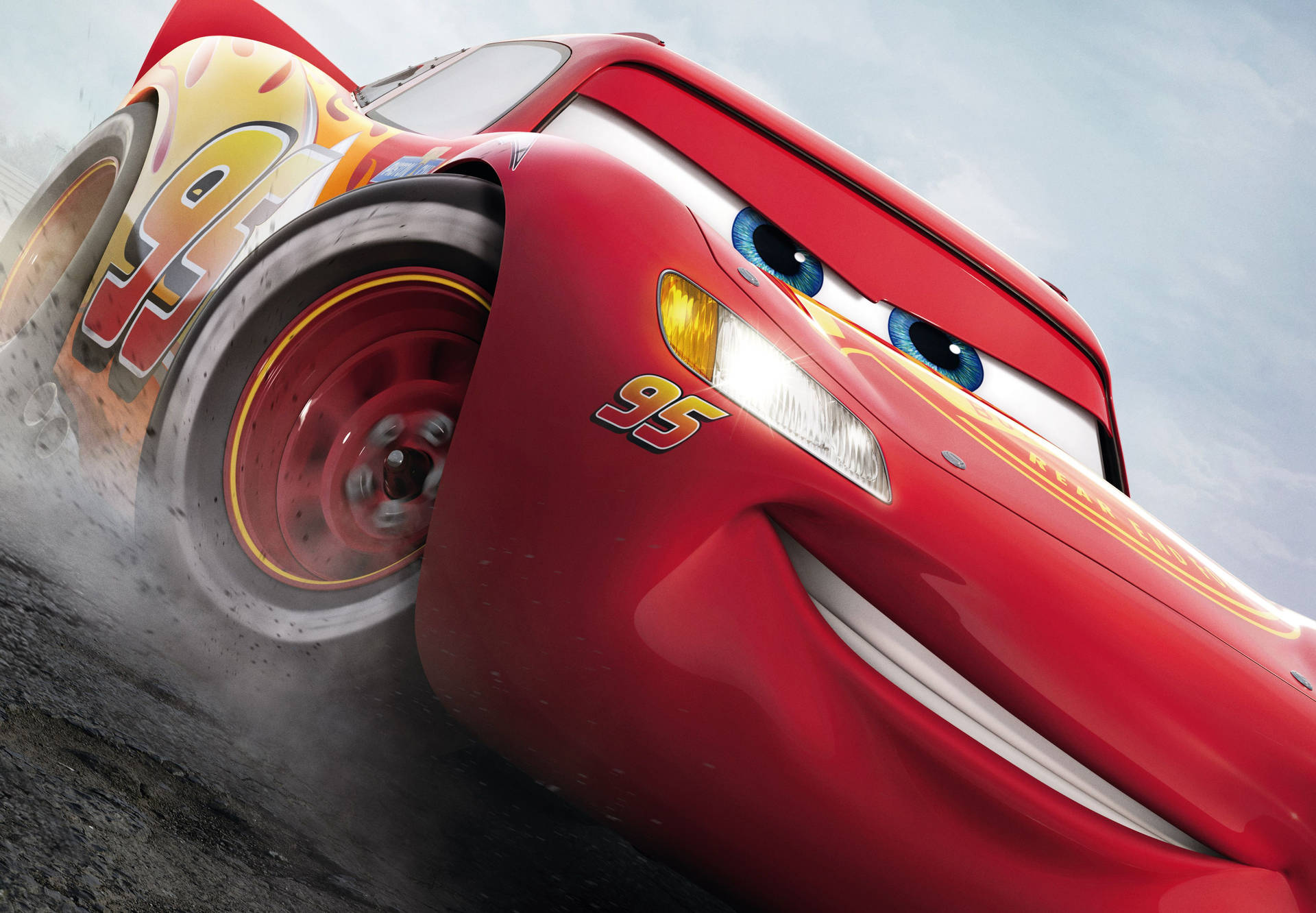 Lightning Mcqueen Racing On Track Background