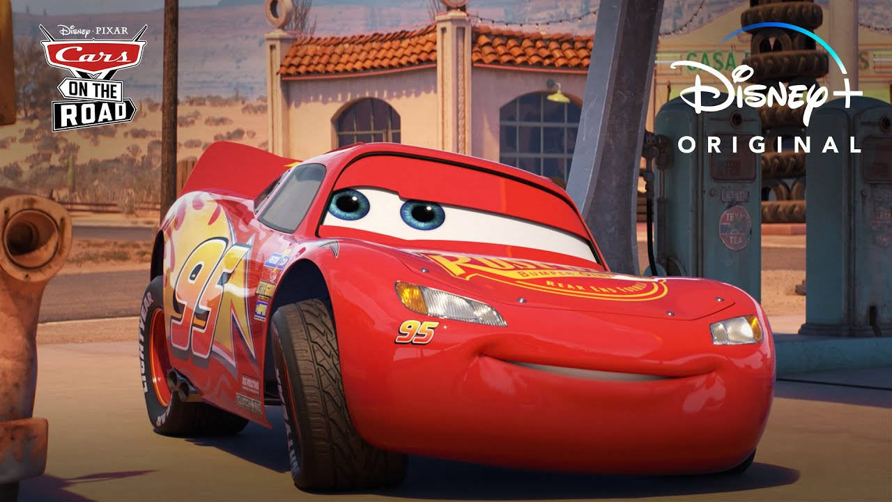 Lightning Mcqueen Speeding On The Race Track Background