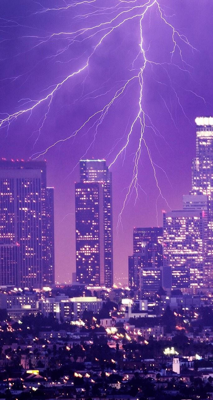 Lightning Over City Neon Purple Iphone Background
