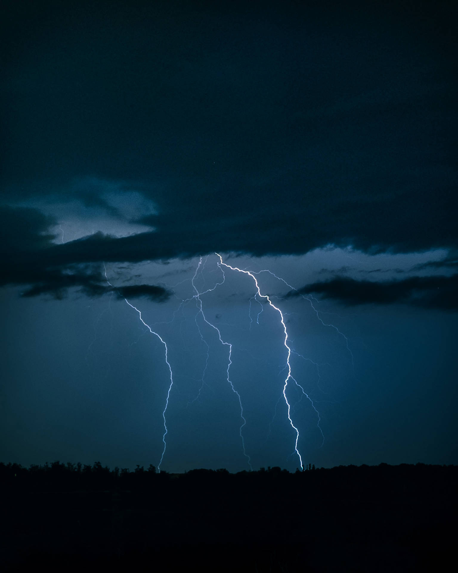 Lightning Strikes And Storm Clouds Background