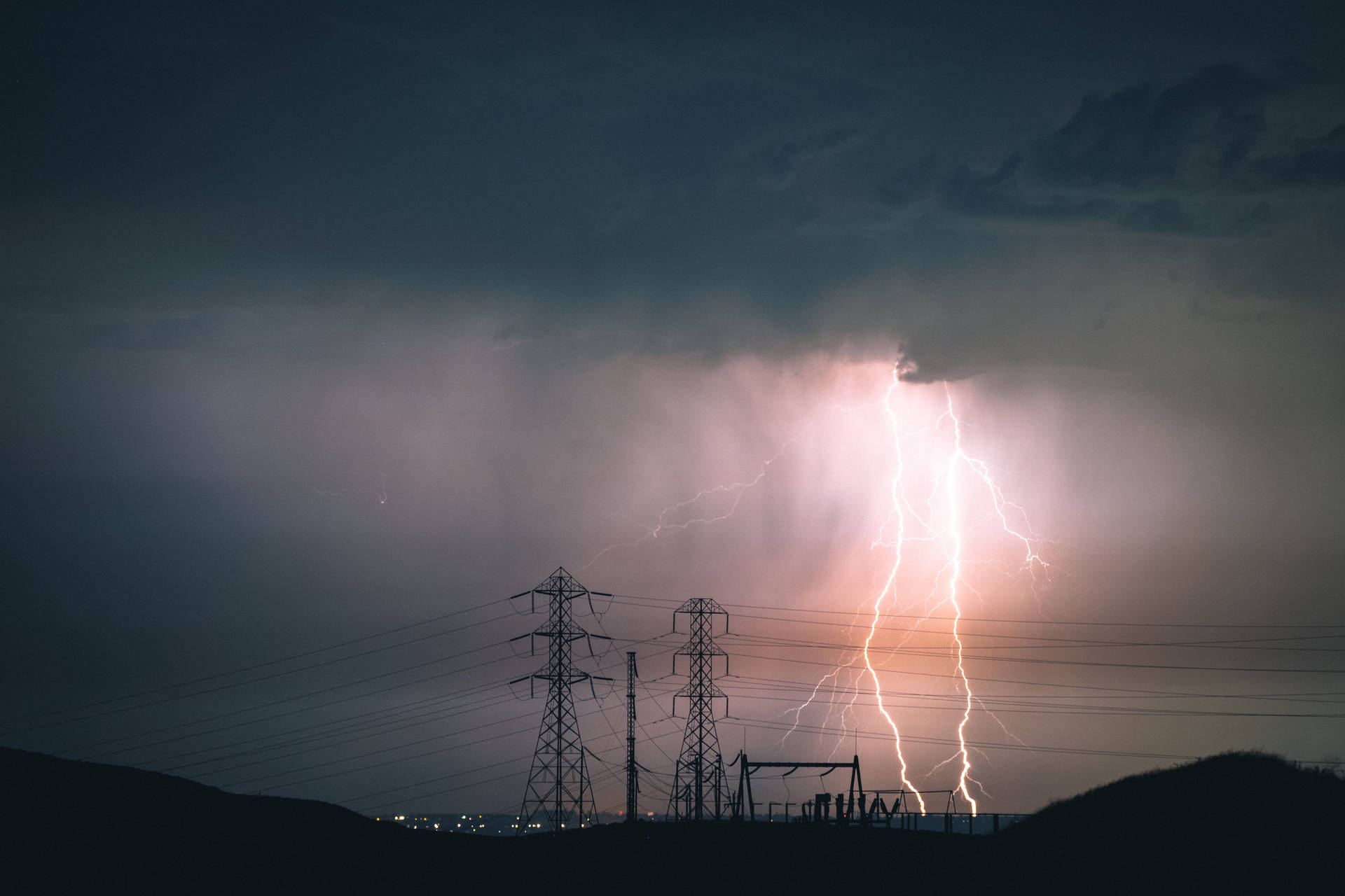 Lightning Strikes In Electric Poles Background