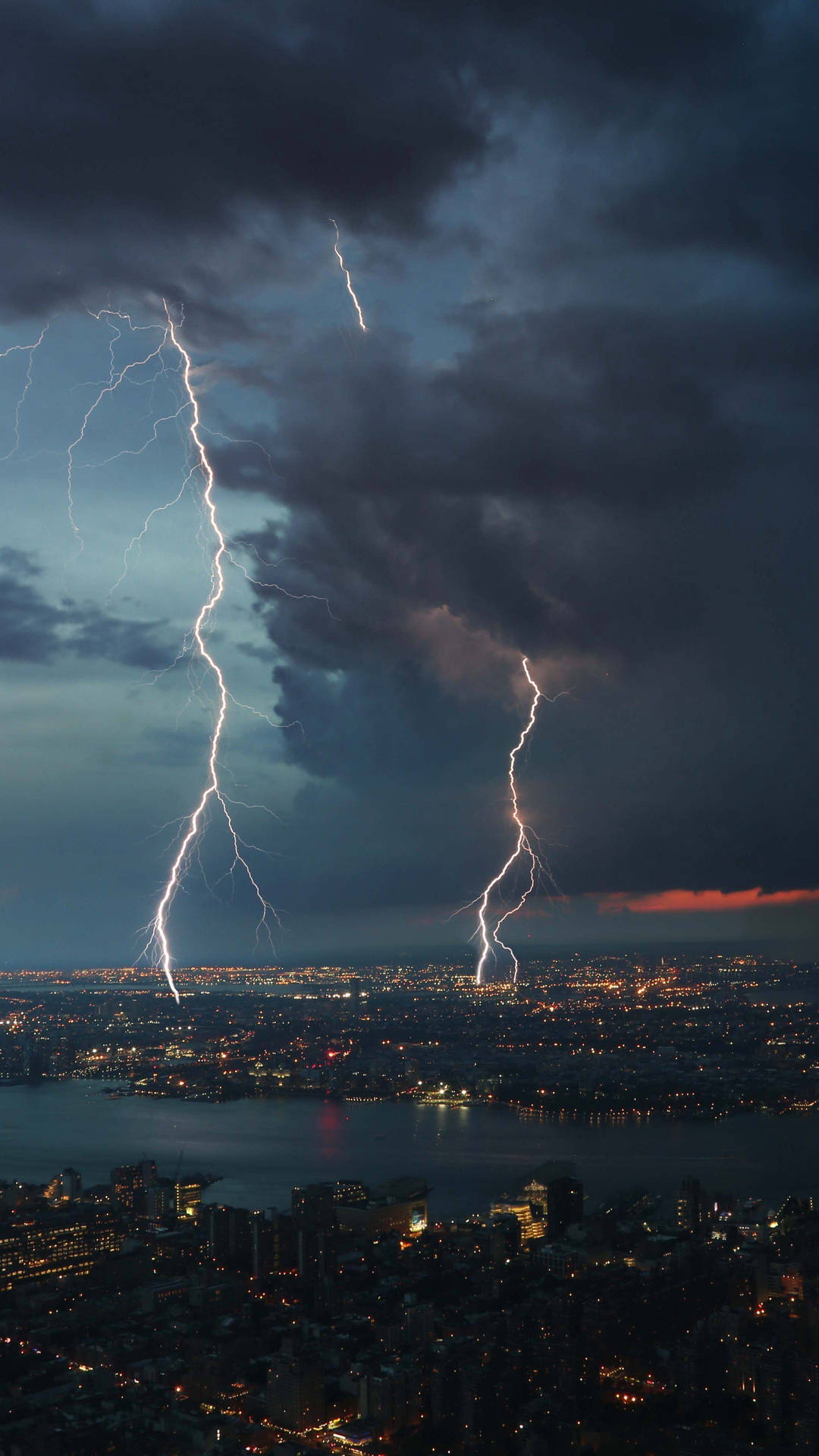 Lightning Strikes Over A City At Night